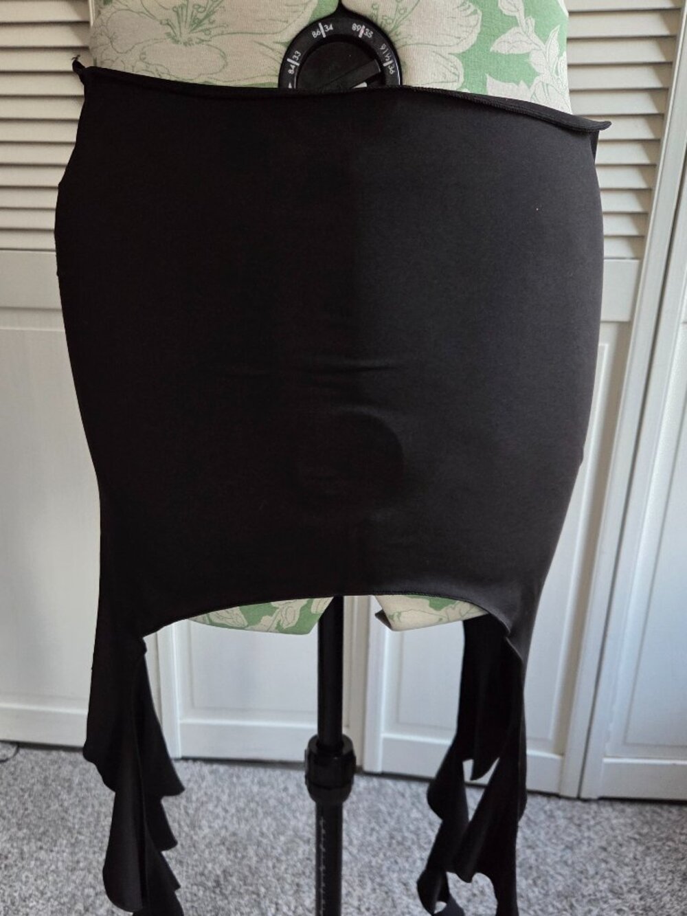 Womens Black Mini Skirt Featuring Asymmetrical Tails & Ruffle